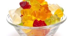13871489 – gummy bear candies in a glass bowl